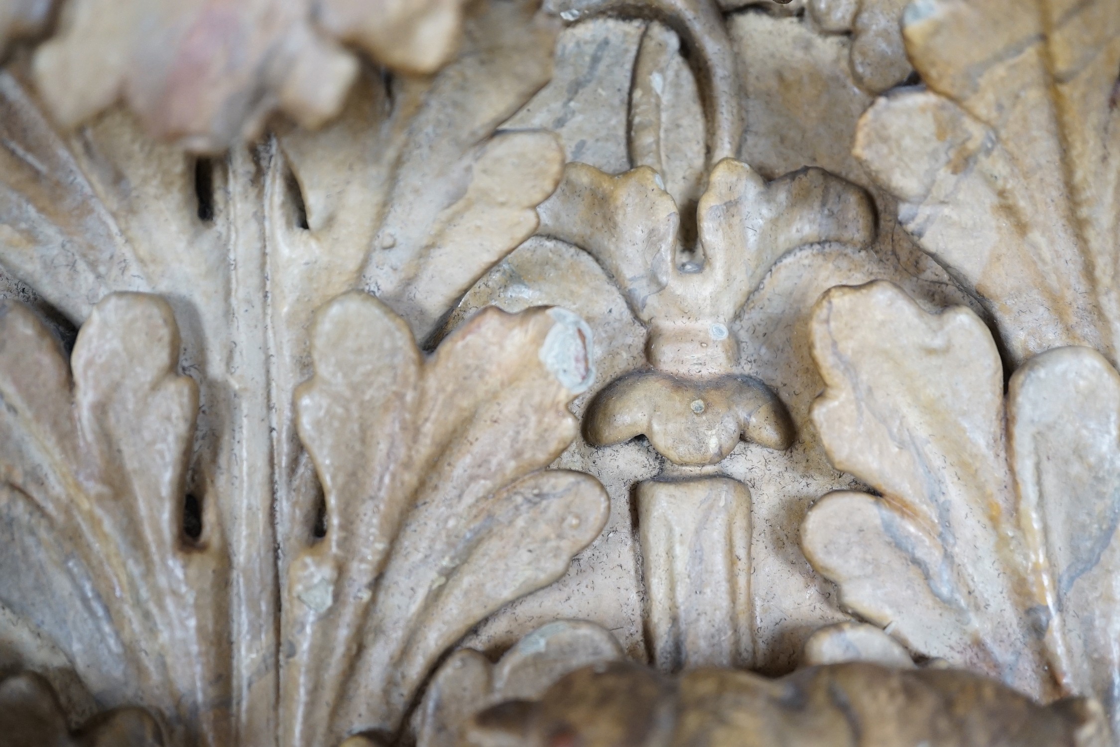 A large 19th century carved pine and gilt-gesso Corinthian capital, 33cms high x 41cm wide (at the top)